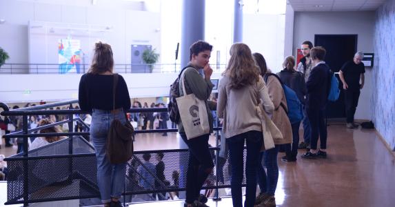 Photo of students talking in the Building